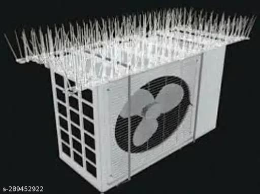 Anti bird spikes installed on a building ledge